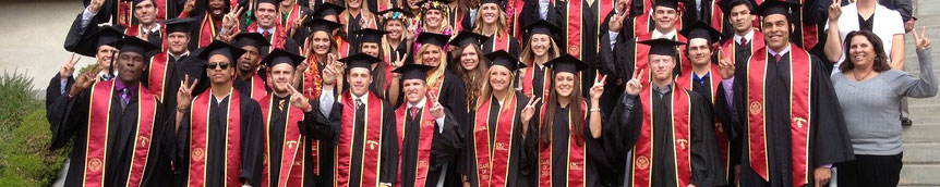 students wearing graduation sashes